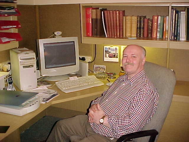Alastair in his new office in 2002