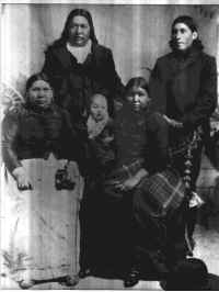 The man and the woman on the left is Lewis Broken Jaw and his wife, Louise Broken Jaw,