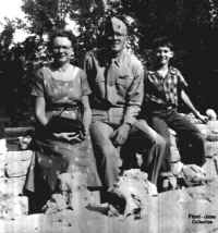 Mrs. John Flood with her two children