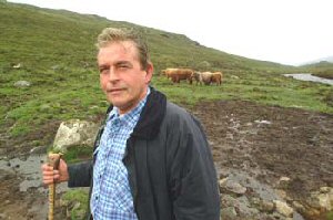 Finlay  with some of his Highland Cattle.