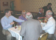 Jim Lynch telling his sad story to Richard Thomson and Allison Hunter, with Alastair Kidd paying some attention;  Bill McBride and Alastair Walker are in the background.