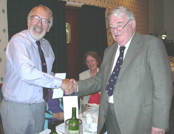 Kenneth Fee, Editor of the Scots Independent, presenting the Oliver Brown Award to Iain Anderson