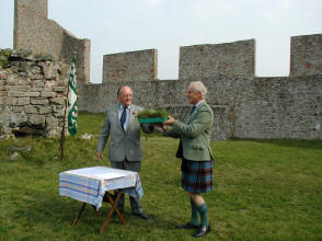 Col Furness handing over turf & stane to Dr Hume