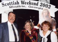 Tom Hodges of Clan Colquhoun with his wife and Beth Gay at the Scottish Weekend 2003. 