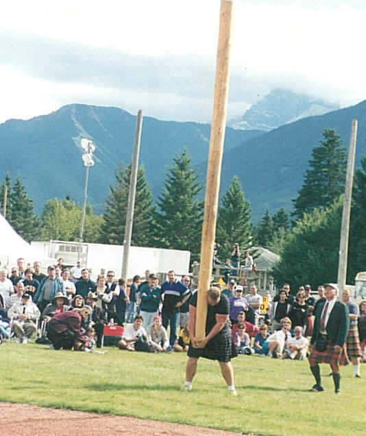 Unidentified caber tosser battles it out in the Heavy Sports Competition.