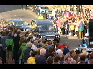 Crowds line the way in Glasgow