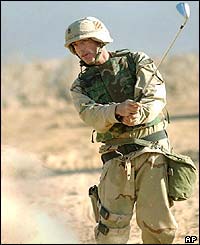 Soldiers find time to practice their swing