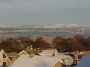 Looking over Falkirk towards Grangemouth and the Lochganit Power Station