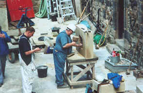 A stone cutter at work at Edinburgh Castle. The stonework rerquires constant maintenance, and the old arts are still practiced.