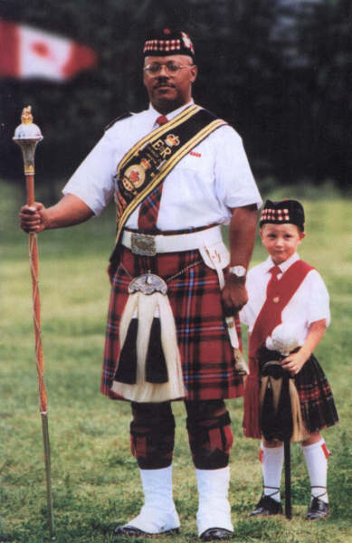Nathan T. Brown, Sr. and step-son Dylan from the 2001 Chatham Tartan Sertoma Highland Games