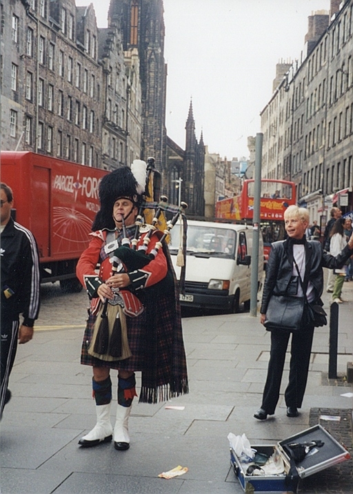 Linda with her Piper on the Royal Mile